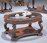 HAND CARVED ANTIQUE FINISH COFFE TABLE WITH GLASS INLAY