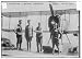 Photo (L): F.H. Burnside, Lt. Anthony Sunderland, J.D. Hill, Corp. C.T. Robbins