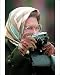 Photographic Print of Queen Elizabeth II uses a Leica camera from PA Photos