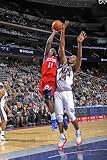 Philadelphia 76ers v New Jersey Nets: Jrue Holiday and Derrick Favors Photographic Poster Print by David Dow, 28x42