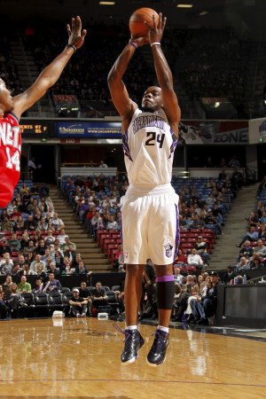 New Jersey Nets v Sacramento Kings: Carl Landry Photographic Poster Print by Don Smith, 12x18
