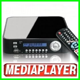 Disque Dur Multimedia Externe avec disque dur 1To (1000Go) - video composite / RVB - H�te USB. Compatible windows 7/ Vista / XP /2000 et MAC OS 10.2 ou OS X et versions sup�rieures. composite - t�l�commande