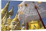 Canvas Prints of Mystical figure, white umbrella and golden stupas, Shwedagon Paya, Yangon from Robert Harding
