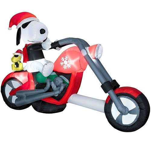 Snoopy Christmas Inflatable Riding On A Motorcycle Looking Cool