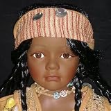 Jolie poupée en porcelaine noire Mubina édition limitée
