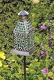 Hand-crafted mosaic hanging lantern designed for tea lights or votives.