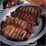 Buffalo Ribeye Steaks Four 10 oz. Image of Buffalo Ribeye Steaks Four 10 oz.