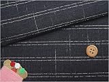 先染め木綿・波にドット（黒）：1m長さ×約110cm幅の画像
