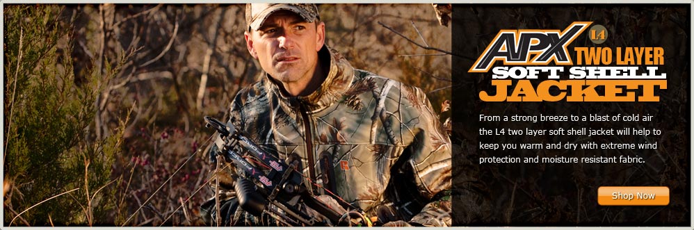Archer in Field Wearing the Russell Outdoors L4 Two Layer Soft Shell Jacket