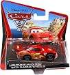 Disney / Pixar CARS 2 Movie 155 Die Cast Checkout Lane Package Lightning McQueen with Racing Wheels