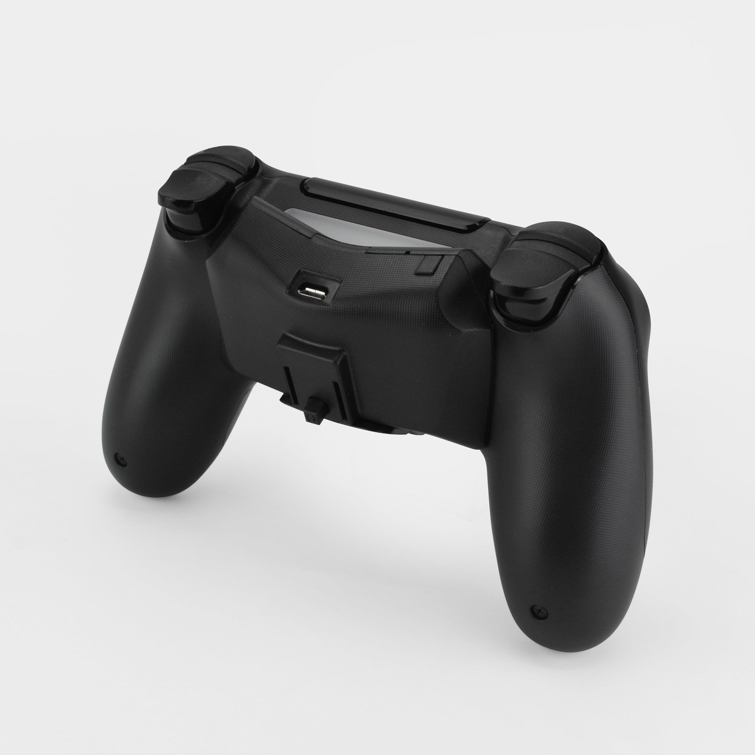 Details and images for Game Tech's DualShock 4 battery addon accessory