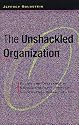 The Unshackled Organization: Facing the Challenge of Unpredictability Through Spontaneous Reorganization