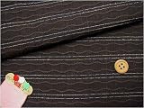 先染め木綿・波にドット（こげ茶）：1m長さ×約110cm幅の画像