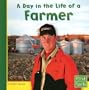 A Day in the Life of a Farmer (First Facts: Community Helpers at Work)