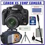 Canon EOS Rebel XS (a.k.a. 1000D) SLR Digital Camera w/ 18-55mm IS Lens + Transcend 8GB Memory Cards + Spare Rechargeable Lithium-Ion Battery + Pro Series Tripod + Shooters Package