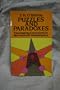 Puzzles and Paradoxes (Dover books on mathematical and word recreations)