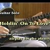 Jay Graydon playing the "Holdin' On To Love" solo from his album AIRPLAY FOR THE PLANET