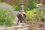 from LA HACIENDA BRONZE CAST IRON CHIMINEA PATIO HEATER WITH PULL OUT GRILL Model 56033DGZ