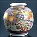 九谷焼 10号 花瓶 「本金花鳥」作家 大雅 陶器,花器,インテリア: 九谷焼の花瓶はそれ自体が既に「花」、350年の歴史を受継ぐ技から生まれる完成度の高いデザイン。他の焼き物の追従を許さぬほど優れた上絵の美しさを存分にお楽しみ下さい。開窯以来350年の歳月を経た現在も尚、その...