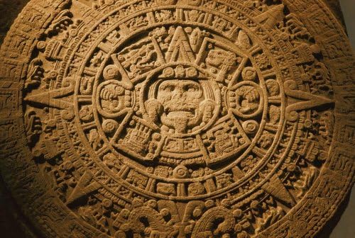 A Closeup of the Center of the 20-ton Aztec Sun Stone Which Depicts the Sun God and the Four Epochs of the Creation and Destruction of the Universe in Aztec M Ythology Other Symbols Represent the 20 Days of the Aztec Month Wall Decal Mural - 24 Inches W x 16 Inches H - Peel and Stick Removable Graphic