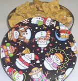 Scott's Cakes Macadamia Nut Brittle in a Happy Snowman Tin