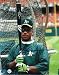 Autographed Rickey Henderson Oakland Athletics Cage 8x10 Photograph