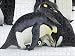 Jigsaw of Emperor Penguin - pair parenting chick from Ardea