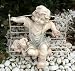 Junge auf einer Gartenbank Skulptur Statue Deko