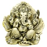 Cream and Green Ganesh Statue on Leaves