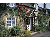IMAGE OF Photographic Prints of Stone cottages with roses on the walls in the Cotswolds village of Winchcombe, from Robert Harding