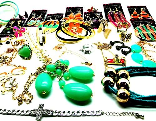 50 Pcs. Costume Jewelry Mix-lot. Includes :10-rings,10-bracelets,20-earrings,10-necklaces. All Pieces Are Retail Card. Over Stock Clearance Sale. Styles Are Assorted and May Vary. At Wholesale Price