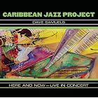 Here and Now: Live in Concert by  Caribbean Jazz Project 