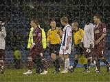 Jigsaw of Albrechtsen debates a point with the referee from West Bromwich Albion FC