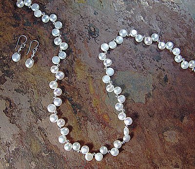 Click here to buy White Freshwater Pearl Drop Earrings.