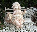 Eigenschaften   / Mädchen auf Gartenbank Skulptur Statue Deko
