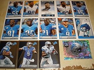 2014 Panini Lions NFL Sticker Collection Team Set. TEAM SET INCLUDES: Lions Logo, Rush Zone, Calvin Johnson, Matthew Stafford, Reggie Bush, Matthew Stafford, Reggie Bush, Joique Bell, Calvin Johnson, Golden Tate, Brandon Pettigrew, Eric Ebron, Ndamukong Suh, Stephen Tulloch