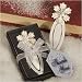 Snow doubt about it! These snowflake design bookmark favors will make your winter event a ball! Heres a crystal clear choice for winter themed favors for all occasions. Capturing the true beauty and shimmer of a single fresh snowflake, these 3 x 1 ¼ snowflake design bookmarks feature a white poly resin bookmark base with a carved snowflake top decorated with shining clear rhinestone accents. Each comes individually packaged in a deluxe box with a clear top and black bottom tied with a white organza bow and an attached snowflake design thank you tag.
