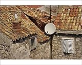 IMAGE OF Photographic Prints of Close-up of roof tiles, old stone walls and satellite dish in the old town of from Robert Harding
