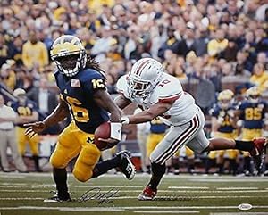 Autographed Denard Robinson Photograph - 16x20 Avoiding Tackle W - JSA Certified - Autographed NFL Photos