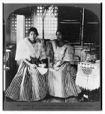 Stereoview (S): School girls in native dress upper garment made of
hemp gauze Philippine Islands