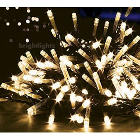 10M 100 LED FAIRY STRING TWINKLE LIGHTS WITH 8 FUNCTIONS IN WARM WHITE ** FULLY WATERPROOF SEALED ON DARK HEAVY DUTY CABLE - CREATE A BEAUTIFUL EFFECT IDEAL FOR CHRISTMAS TREE LIGHTS, FESTIVE LIGHTS, WEDDINGS, ETC **