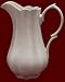 7 1/2 WHITE WEAVES PITCHER - 7 1/2 WHITE WEAVES PORCELAIN PITCHER