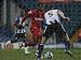 Jigsaw of Nathan Ellington runs past Richard Hinds of Sheffield Wednesday from Watford FC