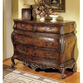 Entryway Bombe Chest with Carvings in Plantation Cherry Finish