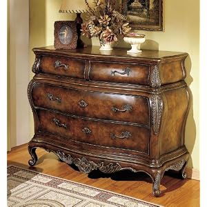 Entryway Bombe Chest with Carvings in Plantation Cherry Finish
