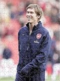 Jigsaw of Alex Hleb (Arsenal) warms up before the match from Arsenal FC