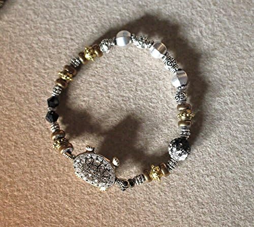 Silver and gold tone crystal turtle bracelt