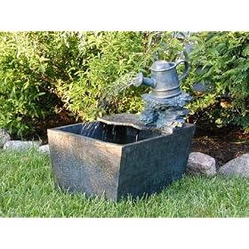 STI Slate base with watering can and planting area from Garden Fountains