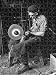 Jigsaw of A Farrier grinding down a horseshoe from Mary Evans