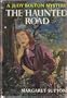 The Haunted Road:  A Judy Bolton Mystery #25